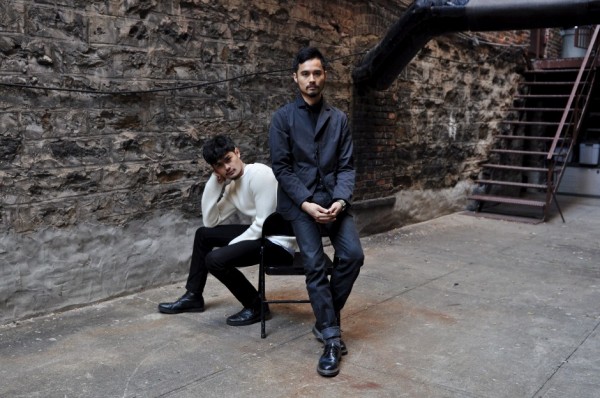 Jimmy Jimeno in a Raf Simons sweater, Lift Label jersey, Number (N)ine jeans, and Tim Hamilton Boots; Joey Jimeno in a Uniqlo turtleneck, Sunny Sports Clothing chore coat, APC New Standard Jeans, and Comme des Garçons x Dr. Martens shoes