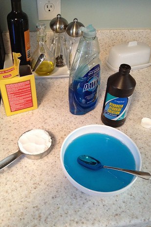 Dawn, hydrogen peroxide, and baking soda will get set-in baby food stains out of a onesie.