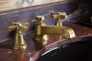 Caxton Undermount Sink  
 Pinstripe Sink Faucet
   The classic KOHLER pinstripe faucet in the new brushed brass finish pairs perfectly with the darker color palette of the space.